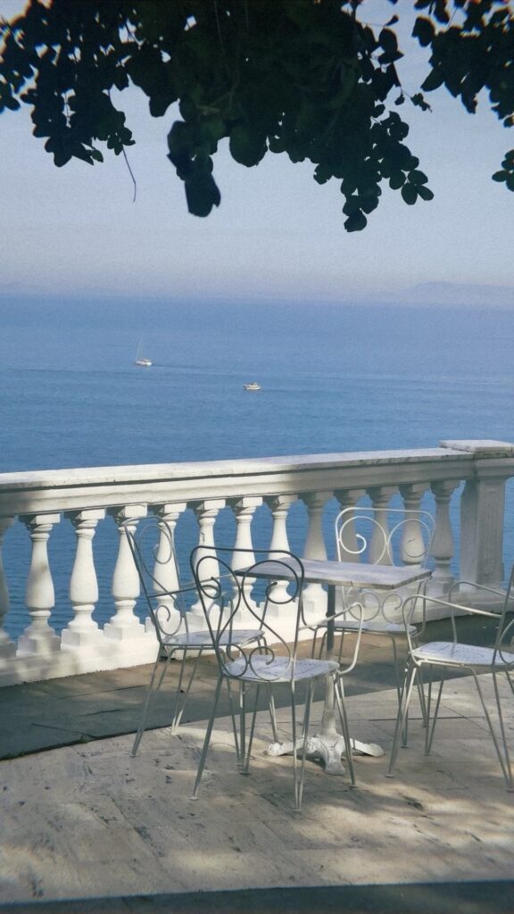 Table seating overlooking the Bay of Naples in Sorrento, Italy.